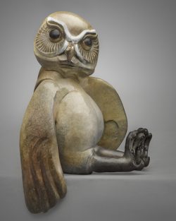 Bronze sculpture of an owl sitting down